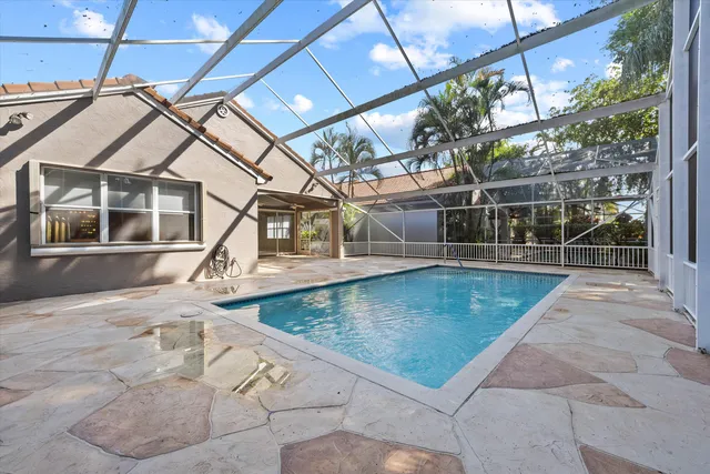 a view of swimming pool from a balcony