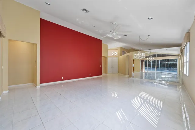 a kitchen with stainless steel appliances granite countertop a sink counter space cabinets and a window
