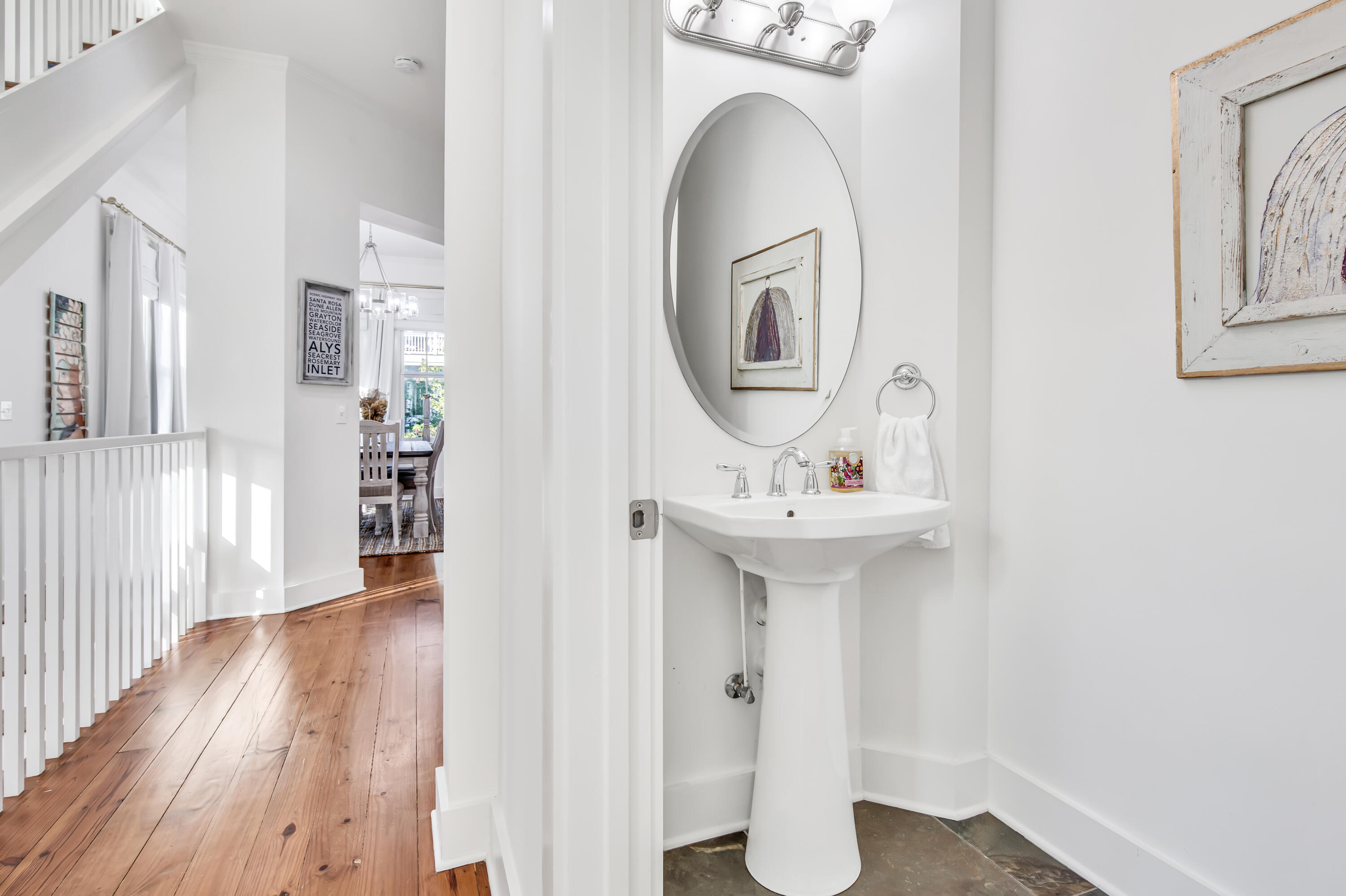 195 Redbud Lane Inlet Beach, FL 32461 - Photo 14 of 24 a bathroom with a sink a mirror and shower