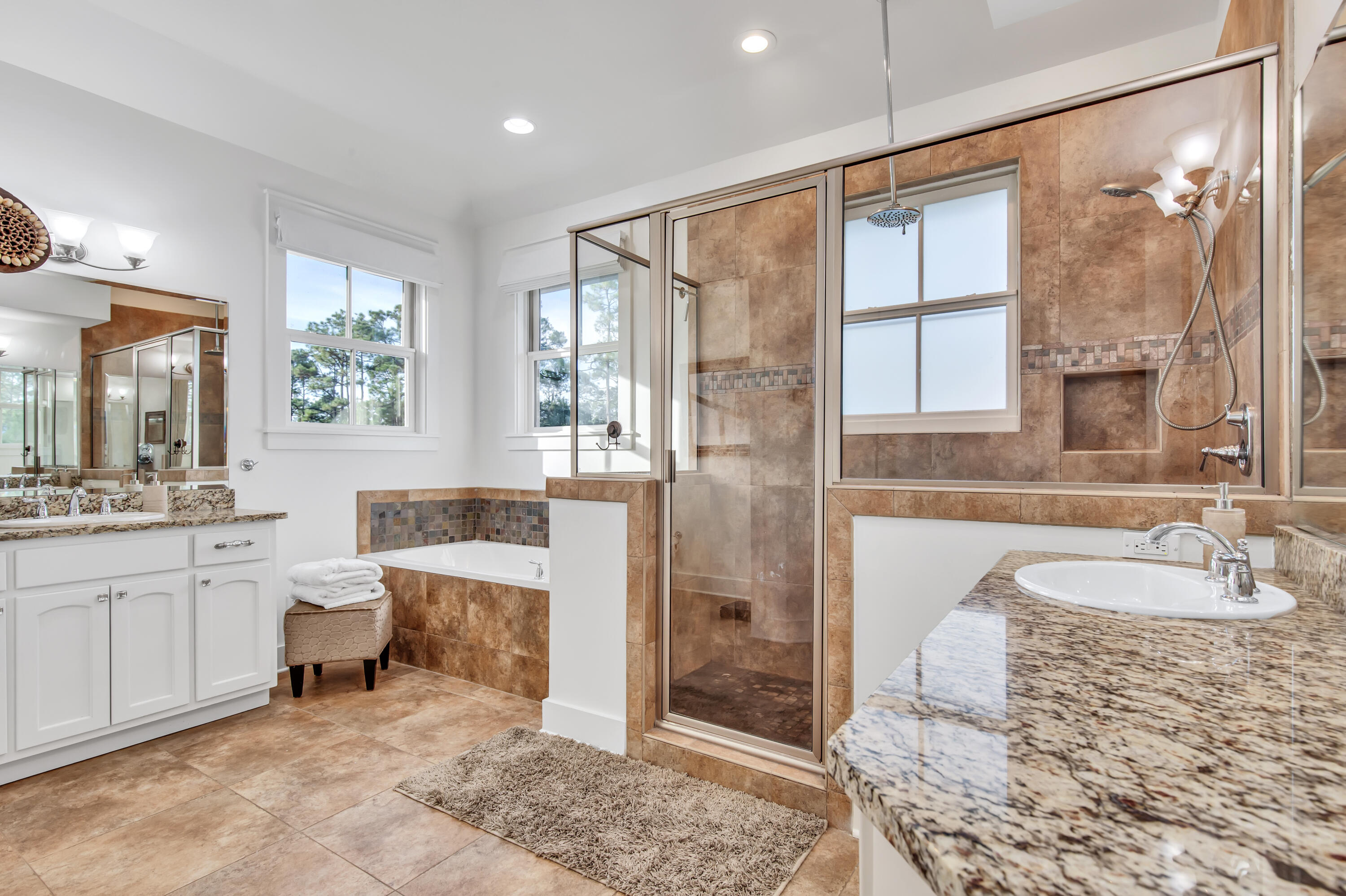 195 Redbud Lane Inlet Beach, FL 32461 - Photo 16 of 24 a spacious bathroom with a granite countertop sink a toilet and shower