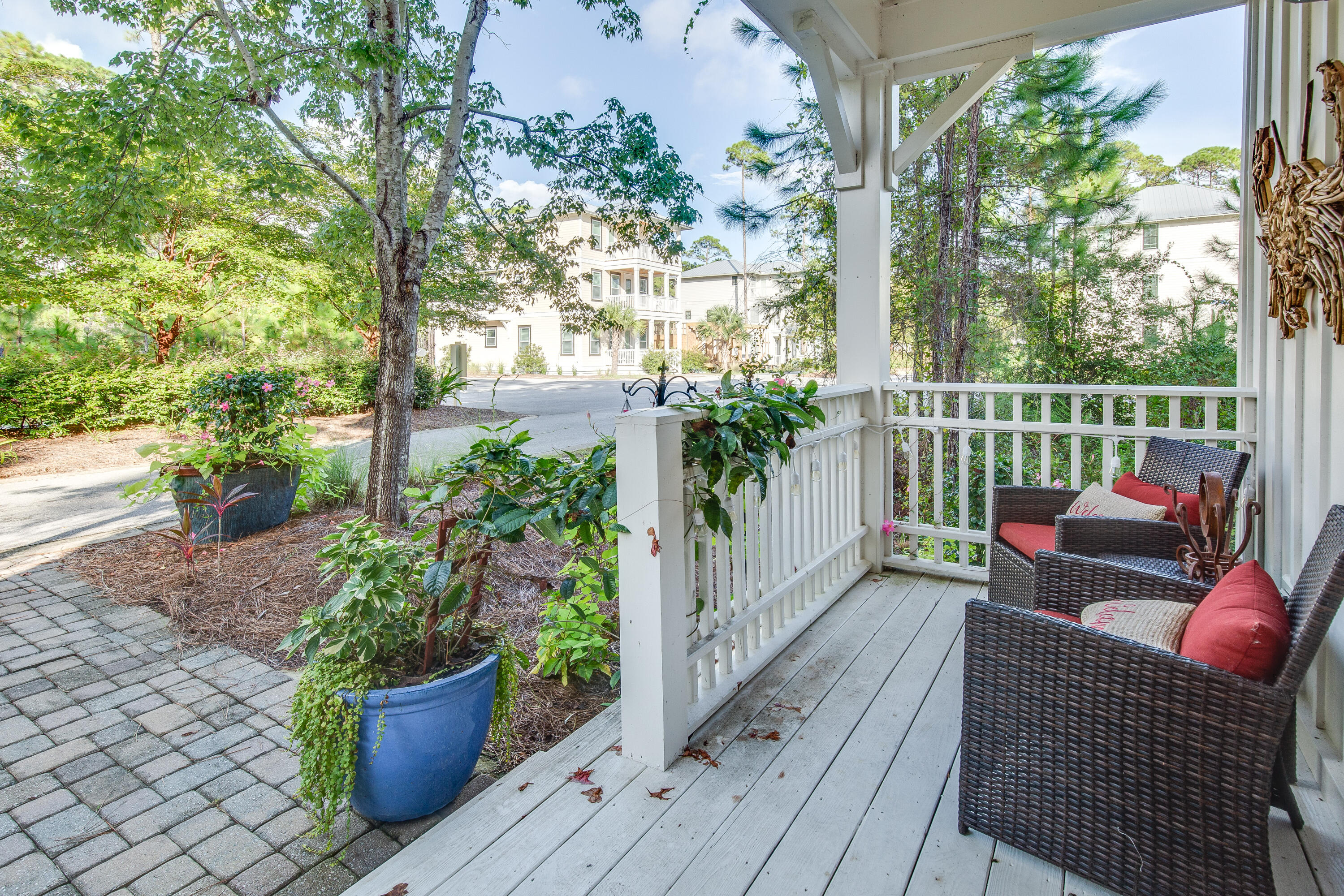 195 Redbud Lane Inlet Beach, FL 32461 - Photo 3 of 24 a view of two chairs in the balcony