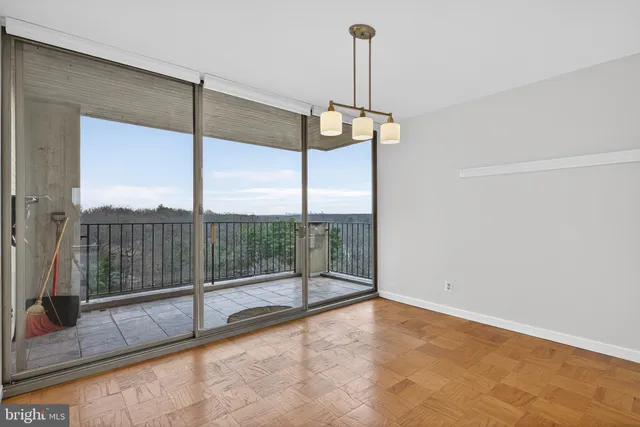 a view of a room with windows