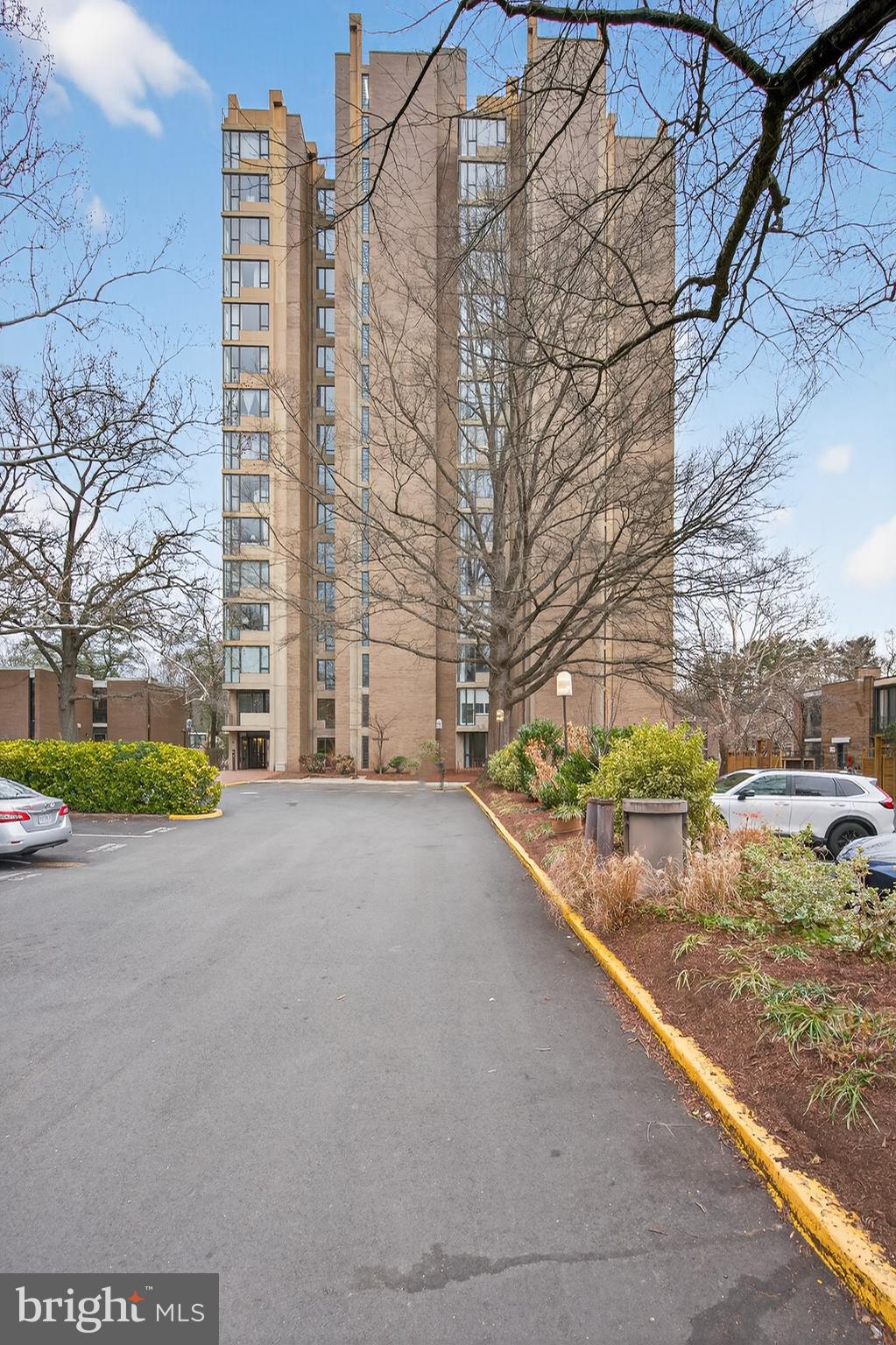 11400 Washington Plaza West, Unit 1303 Reston, VA 20190 - Photo 29 of 34 a view of a road with a building in the background