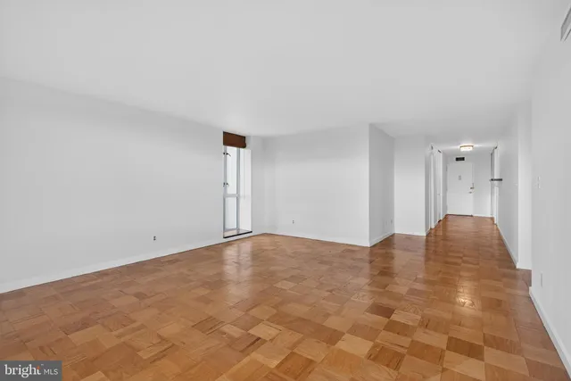 a view of a room with a large window