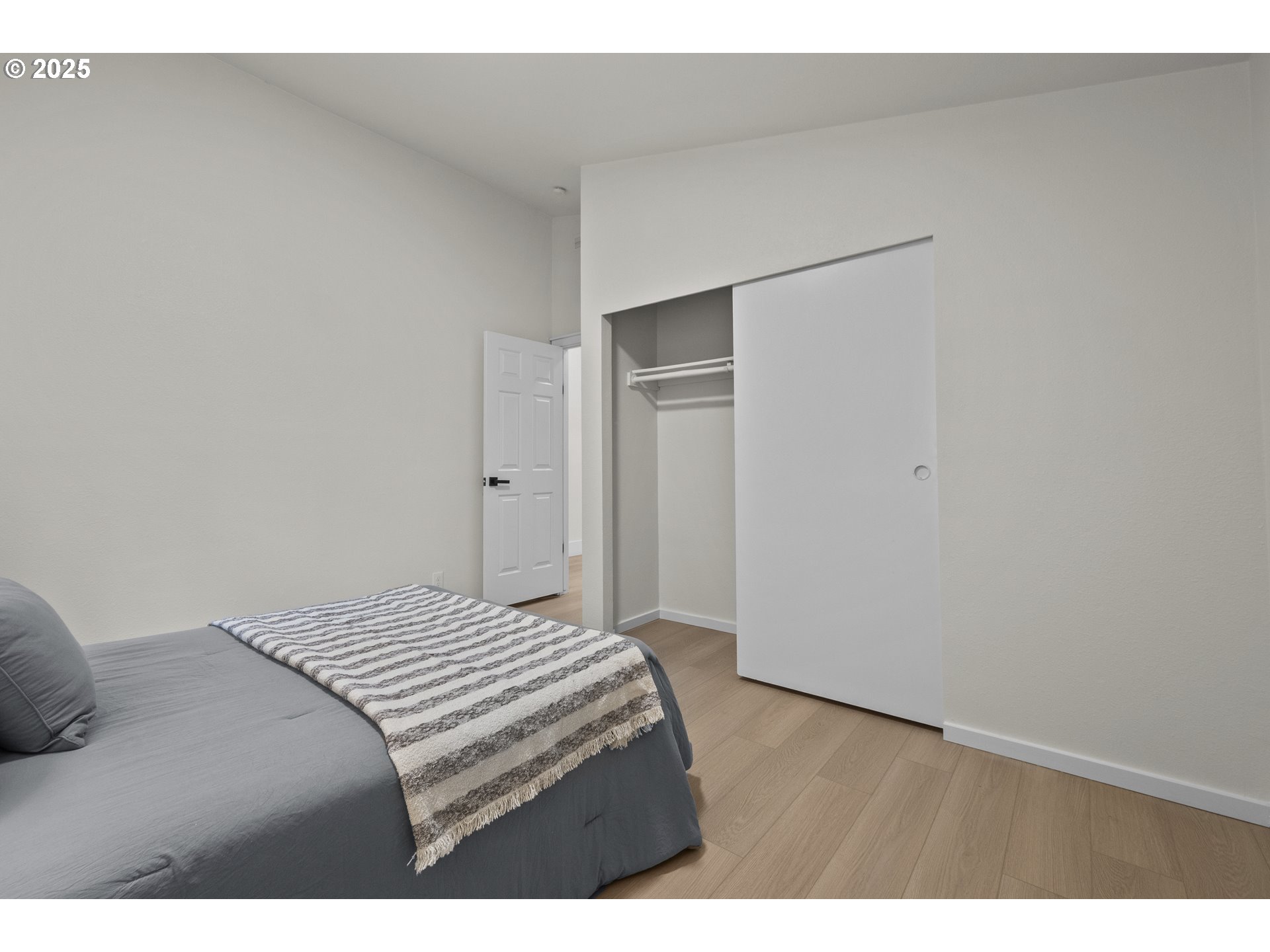 15776 South Pierce Road Molalla, OR 97038 - Photo 19 of 29 a bedroom with a bed and a painting on the wall