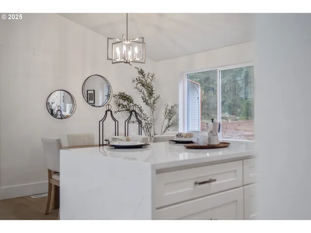 a view of a hallway with washer and dryer