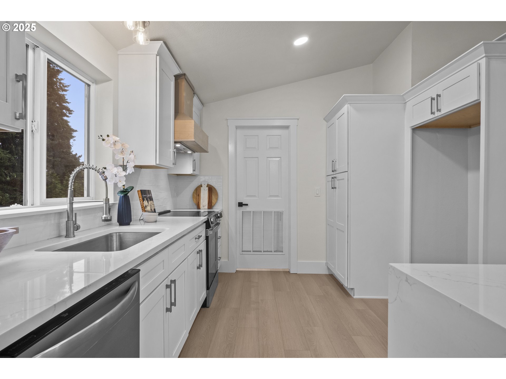 15776 South Pierce Road Molalla, OR 97038 - Photo 10 of 29 a kitchen with a sink cabinets and a window