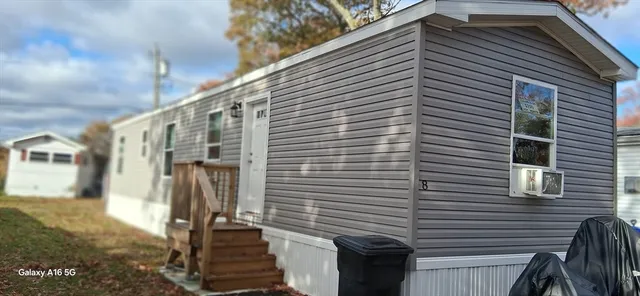 a view of a house with a street