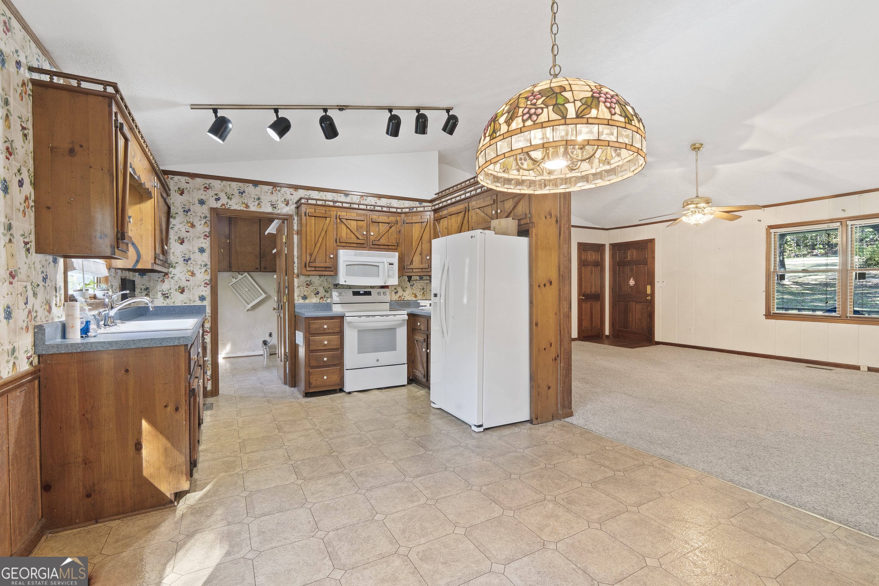 124 Coppergate Lane Macon, GA 31211 - Photo 19 of 46 a very nice looking open kitchen with a large window