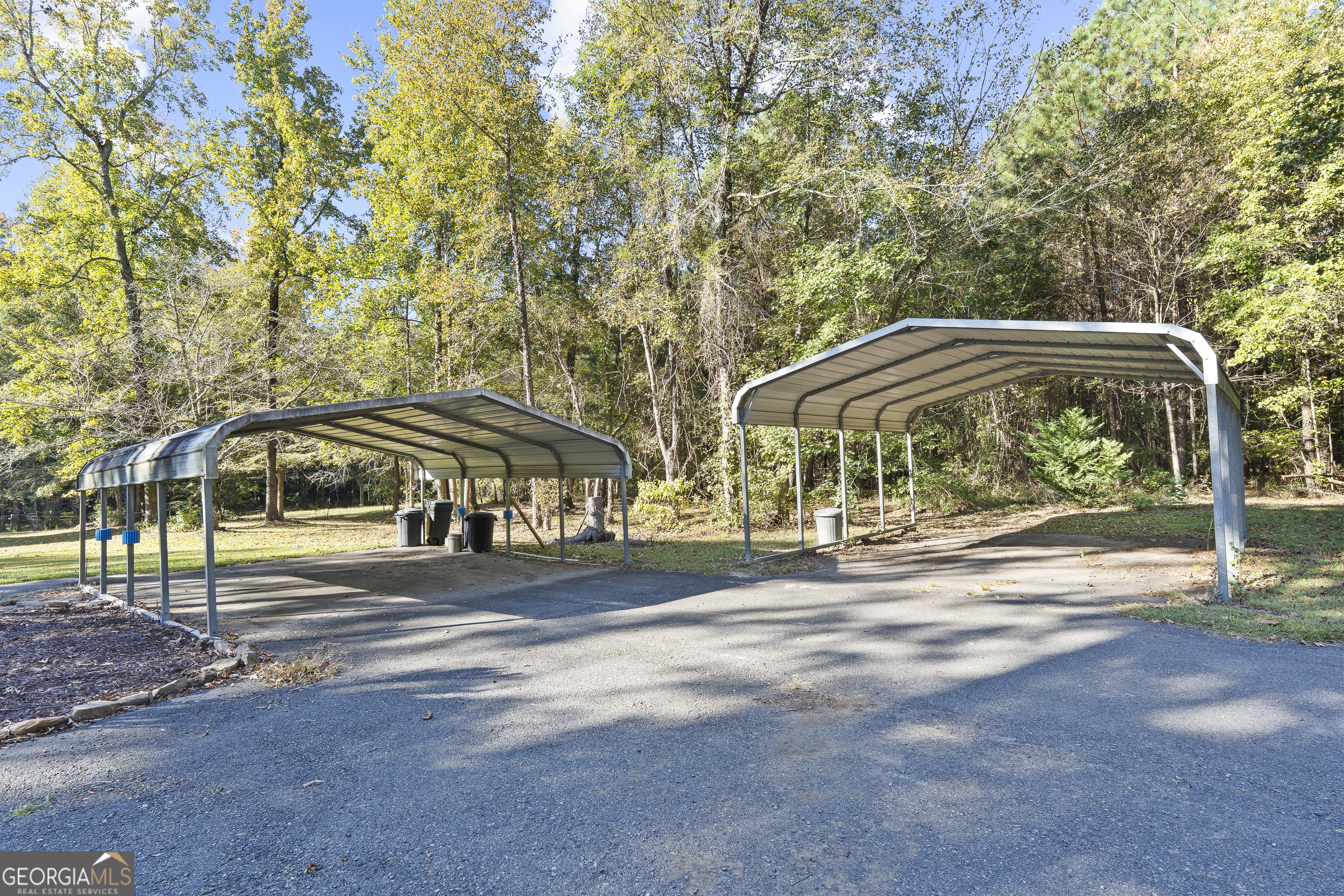124 Coppergate Lane Macon, GA 31211 - Photo 2 of 46 a view of street with houses and trees