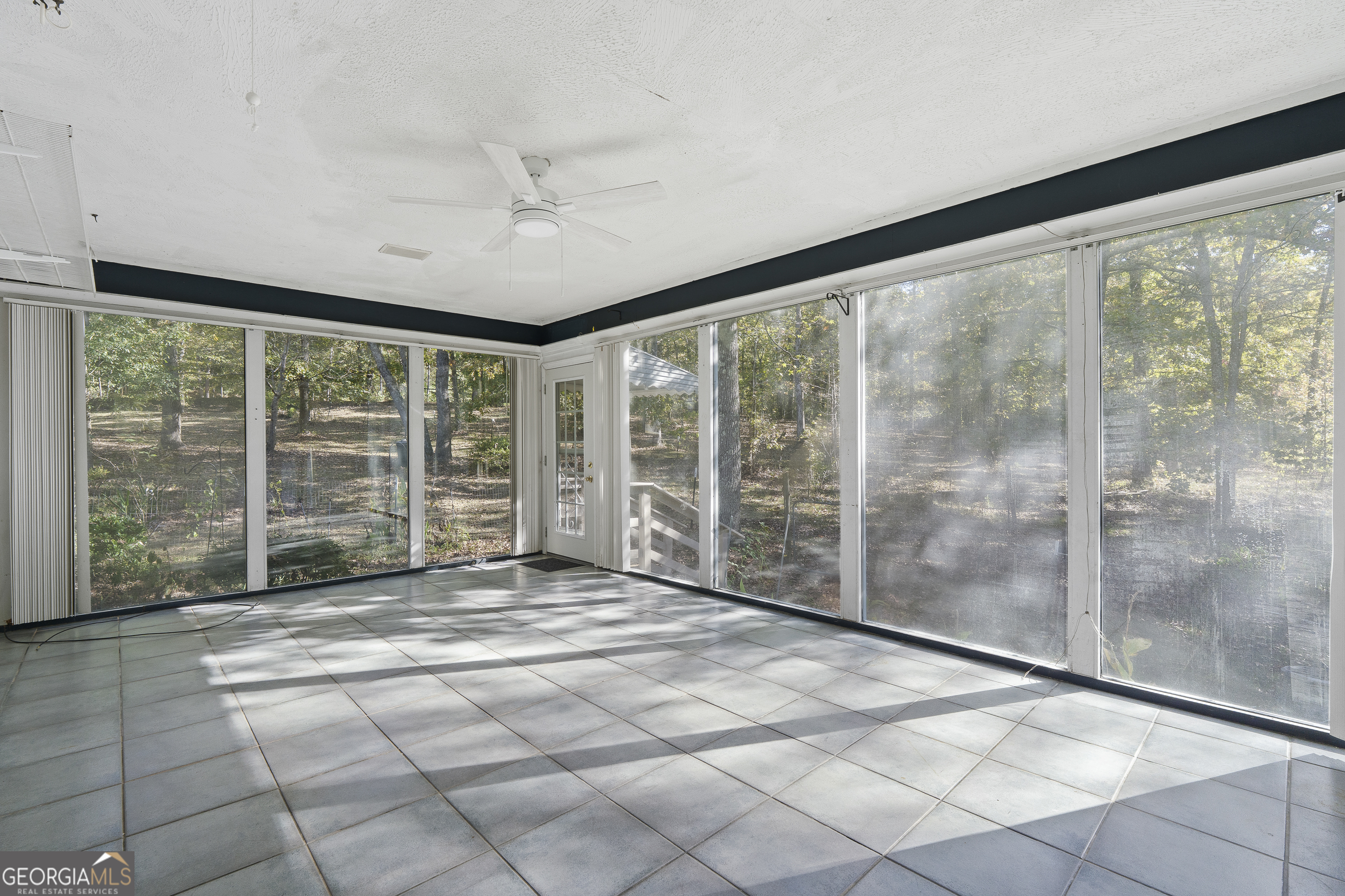 124 Coppergate Lane Macon, GA 31211 - Photo 26 of 46 a view of an empty room with windows