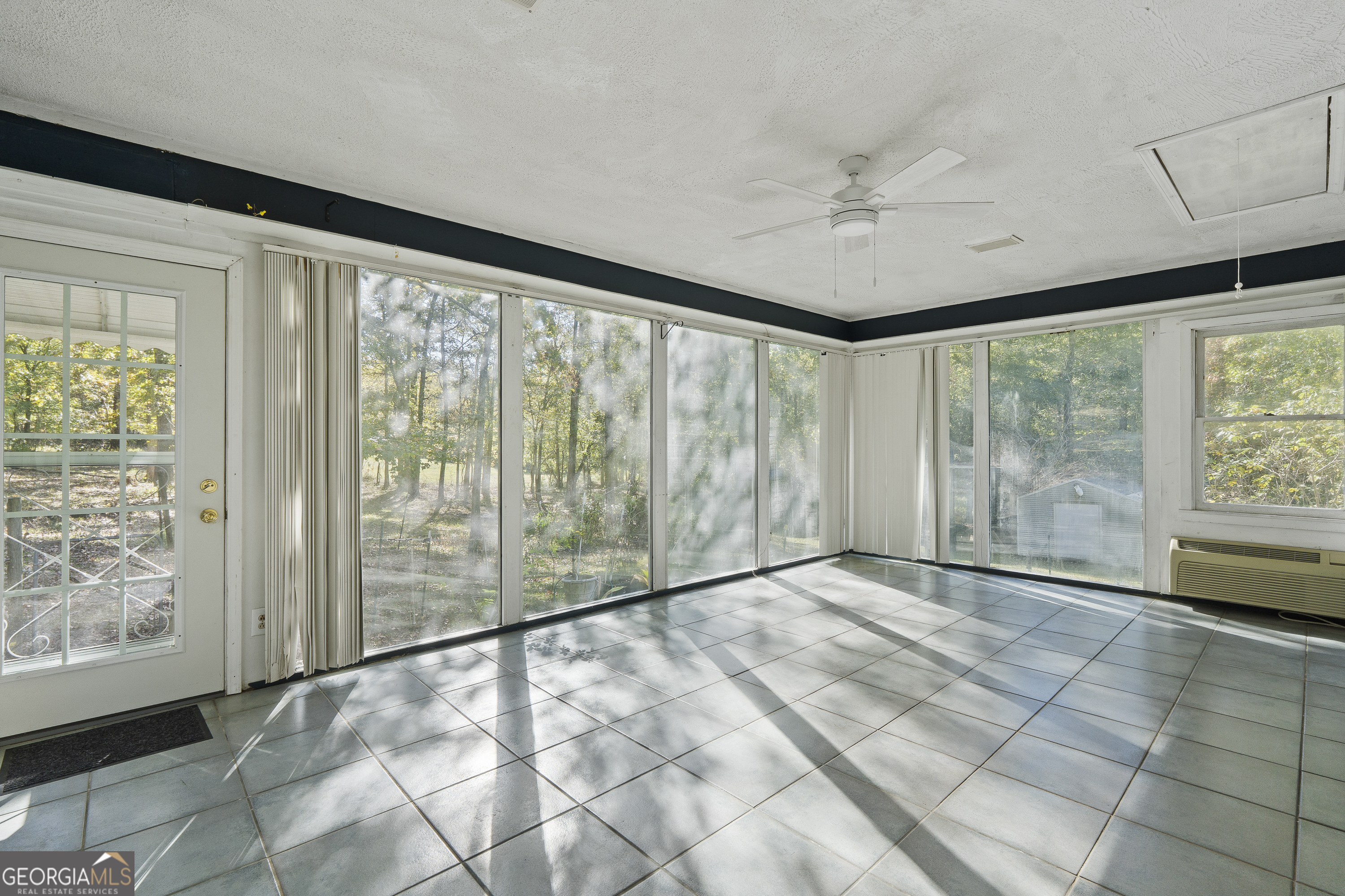 124 Coppergate Lane Macon, GA 31211 - Photo 27 of 46 a view of an empty room with a window