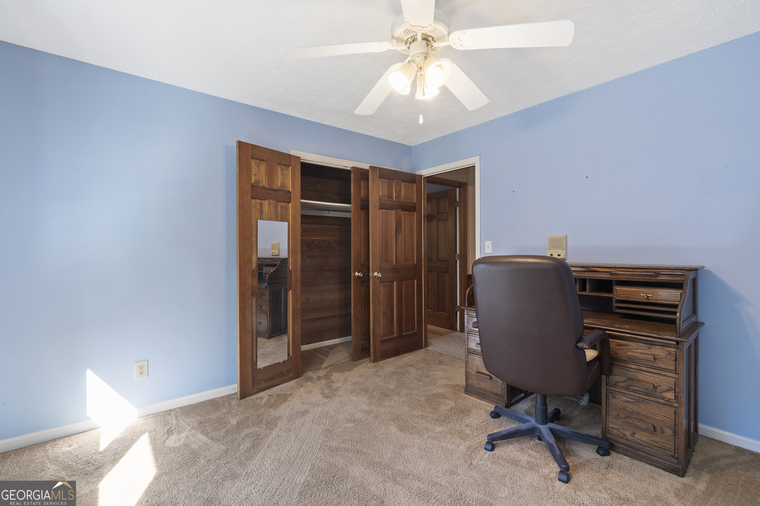 124 Coppergate Lane Macon, GA 31211 - Photo 33 of 46 a view of a workspace with furniture and a ceiling fan