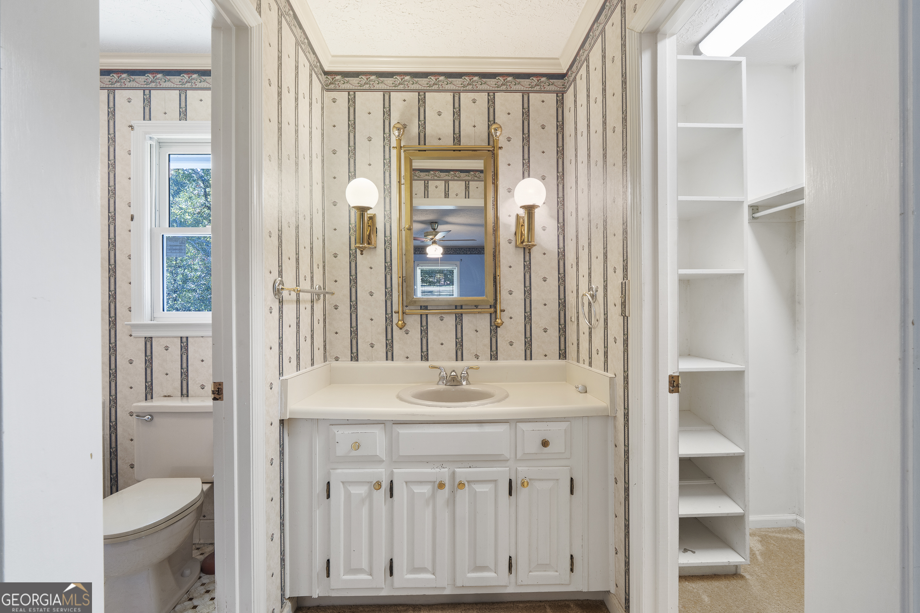124 Coppergate Lane Macon, GA 31211 - Photo 36 of 46 a bathroom with a sink and a mirror