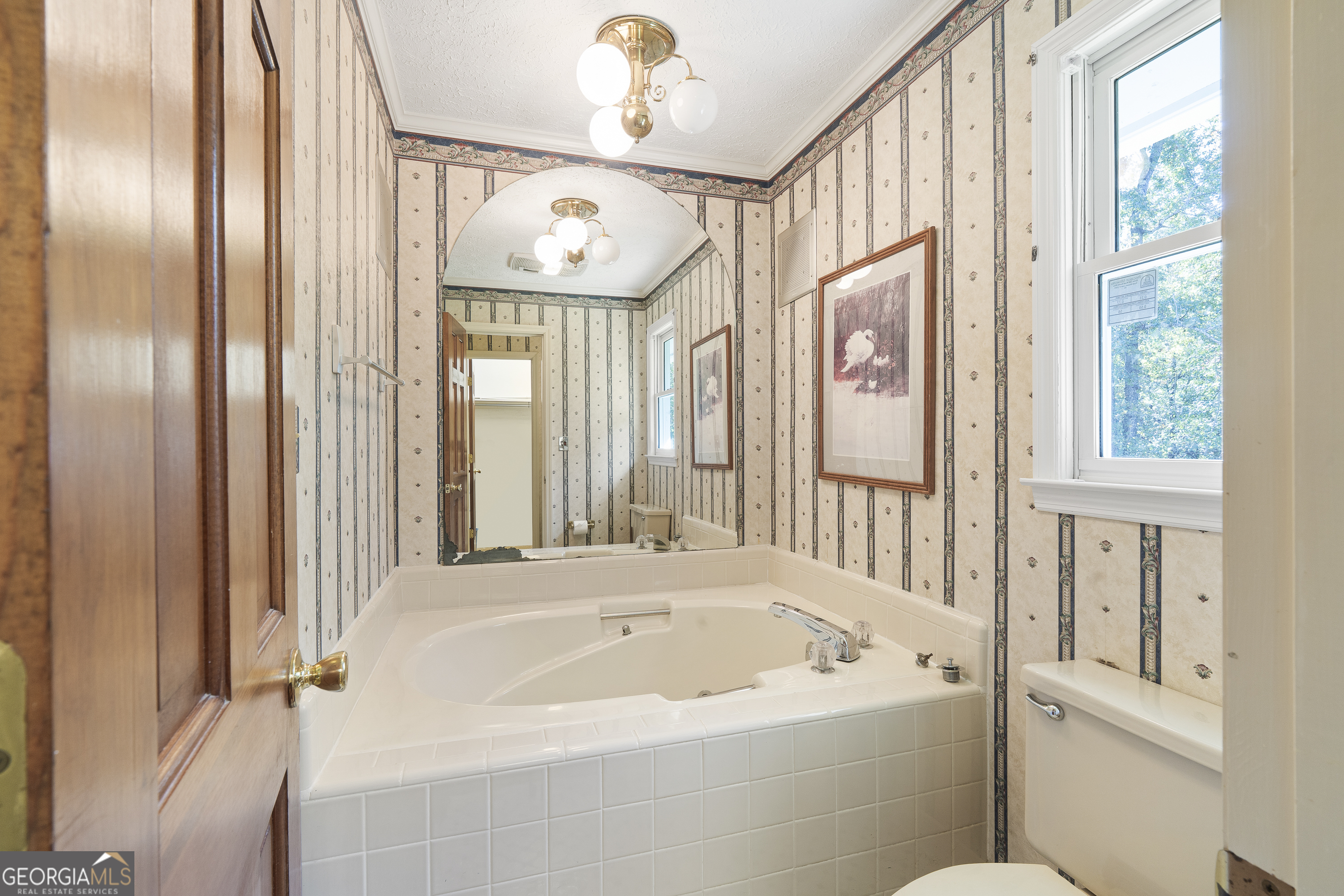 124 Coppergate Lane Macon, GA 31211 - Photo 38 of 46 a white bath tub sitting next to a window