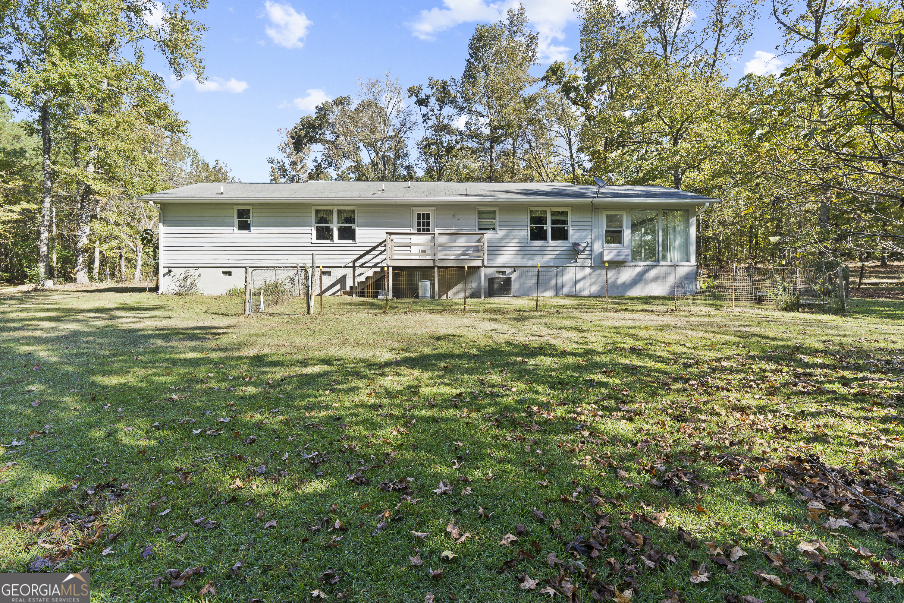 124 Coppergate Lane Macon, GA 31211 - Photo 44 of 46 a view of a house with garden and sitting area