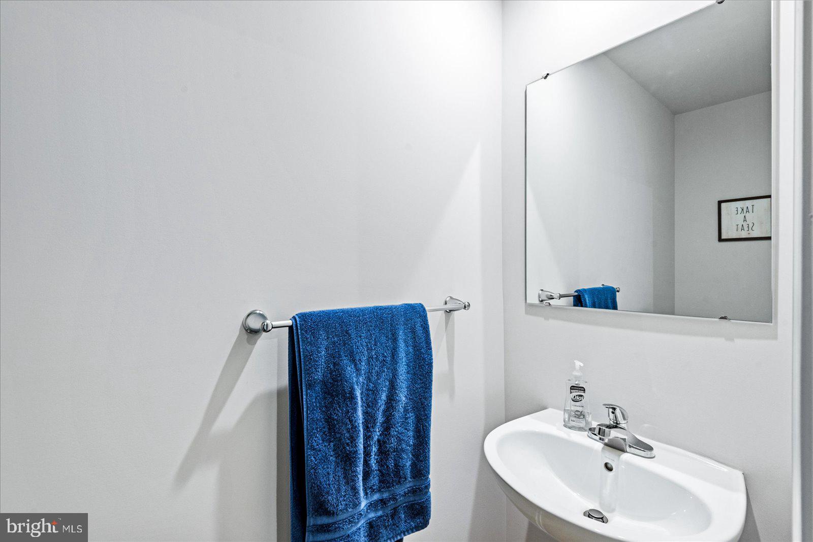 2633 High Point Drive Culpeper, VA 22701 - Photo 13 of 34 a bathroom with a sink and a mirror