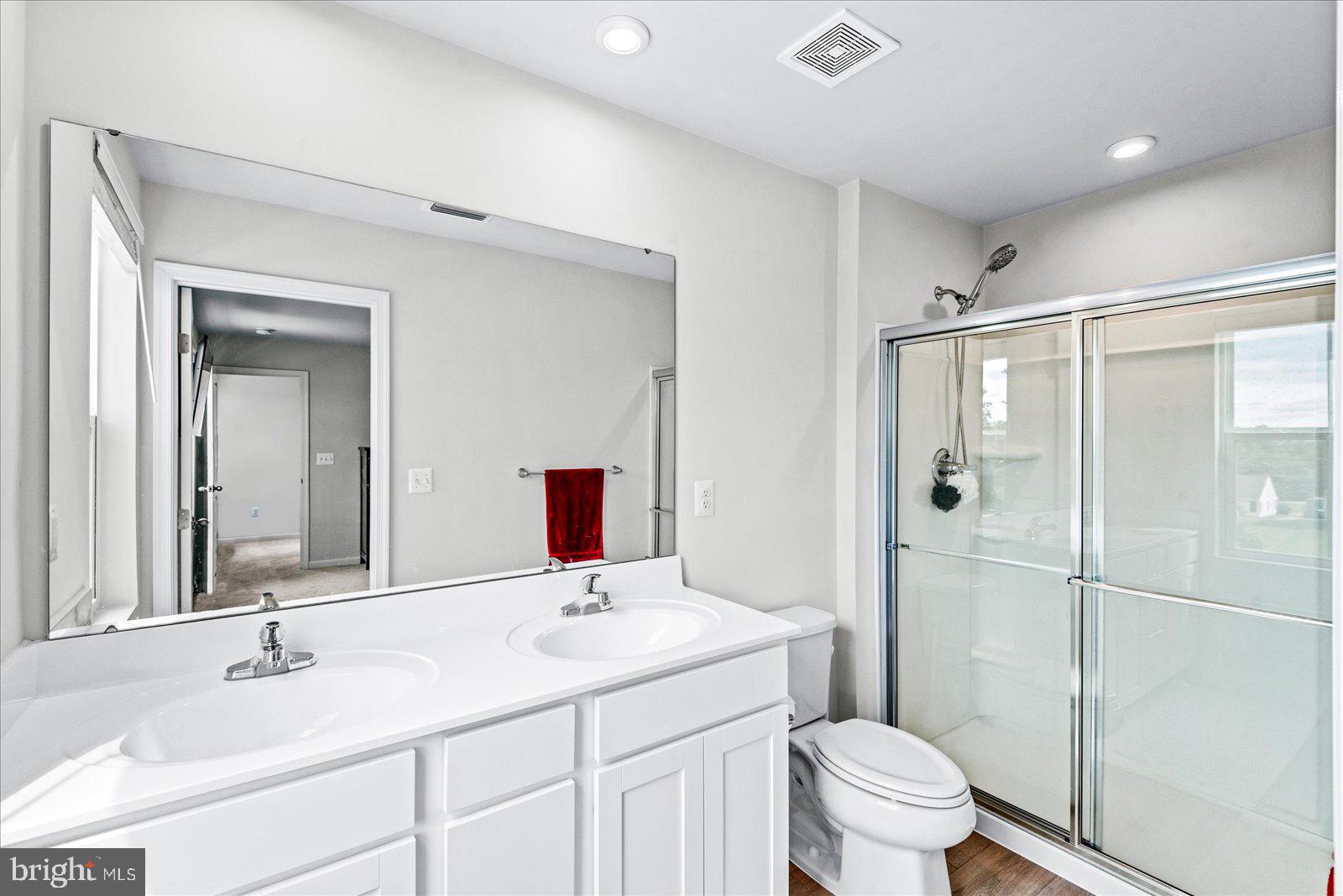 2633 High Point Drive Culpeper, VA 22701 - Photo 16 of 34 a bathroom with a sink toilet and shower