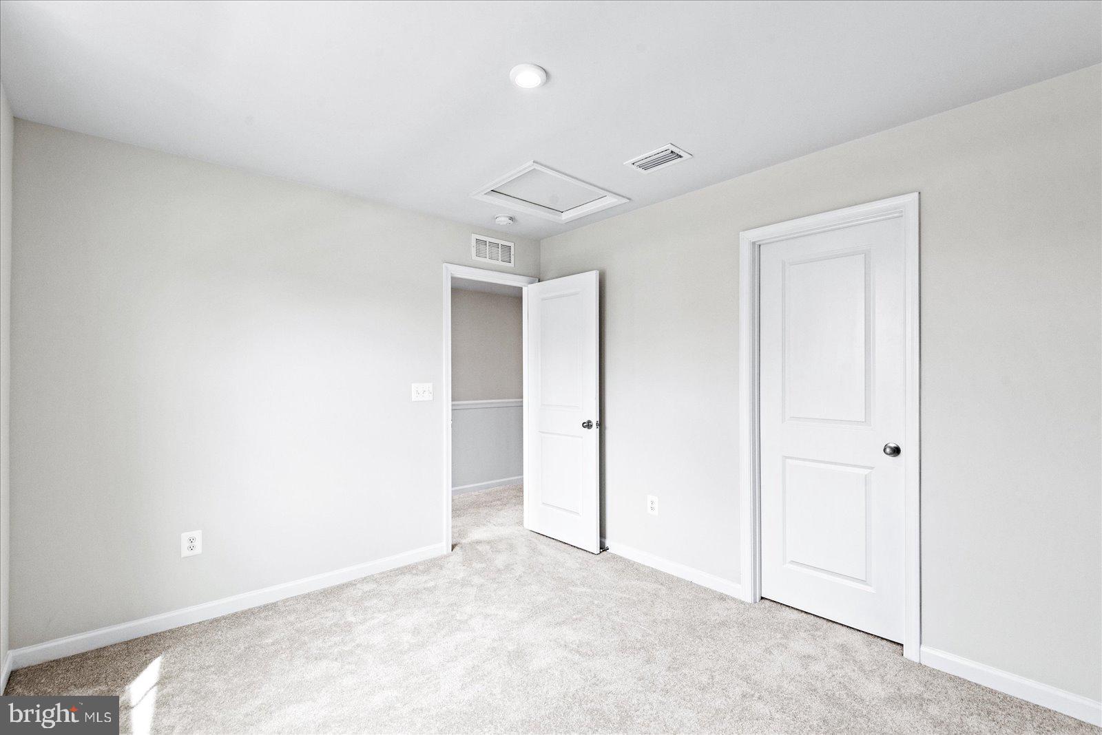 2633 High Point Drive Culpeper, VA 22701 - Photo 18 of 34 an empty room with windows and closet