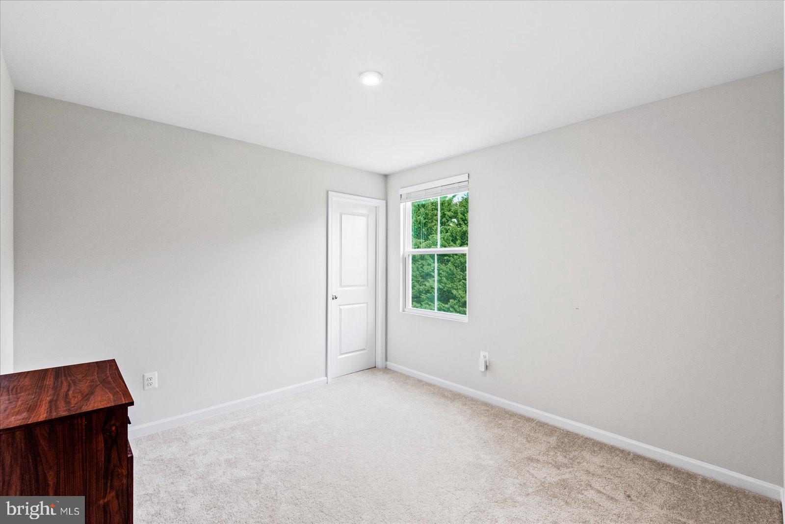 2633 High Point Drive Culpeper, VA 22701 - Photo 21 of 34 an empty room with windows