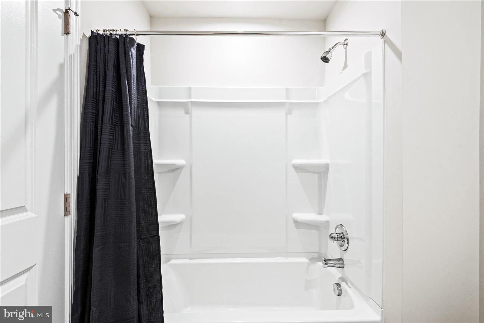 2633 High Point Drive Culpeper, VA 22701 - Photo 24 of 34 a bathroom with a shower and a tub