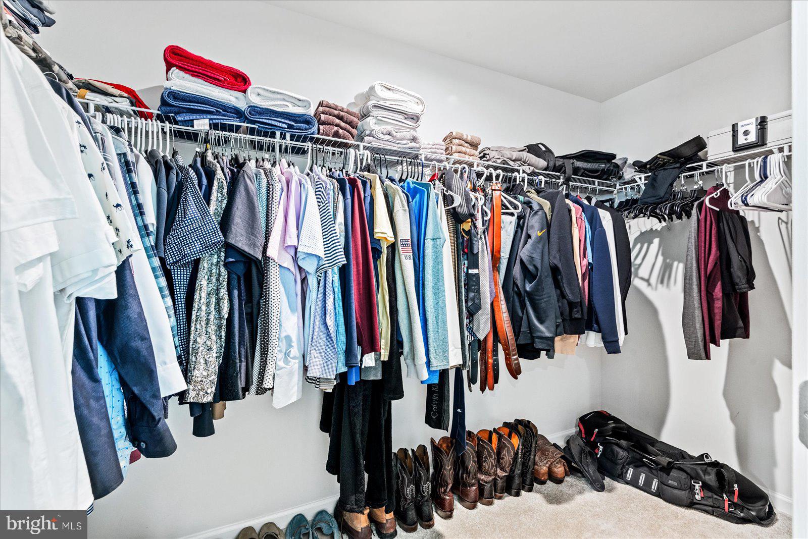 2633 High Point Drive Culpeper, VA 22701 - Photo 26 of 34 a view of walk in closet with clothes and shoes