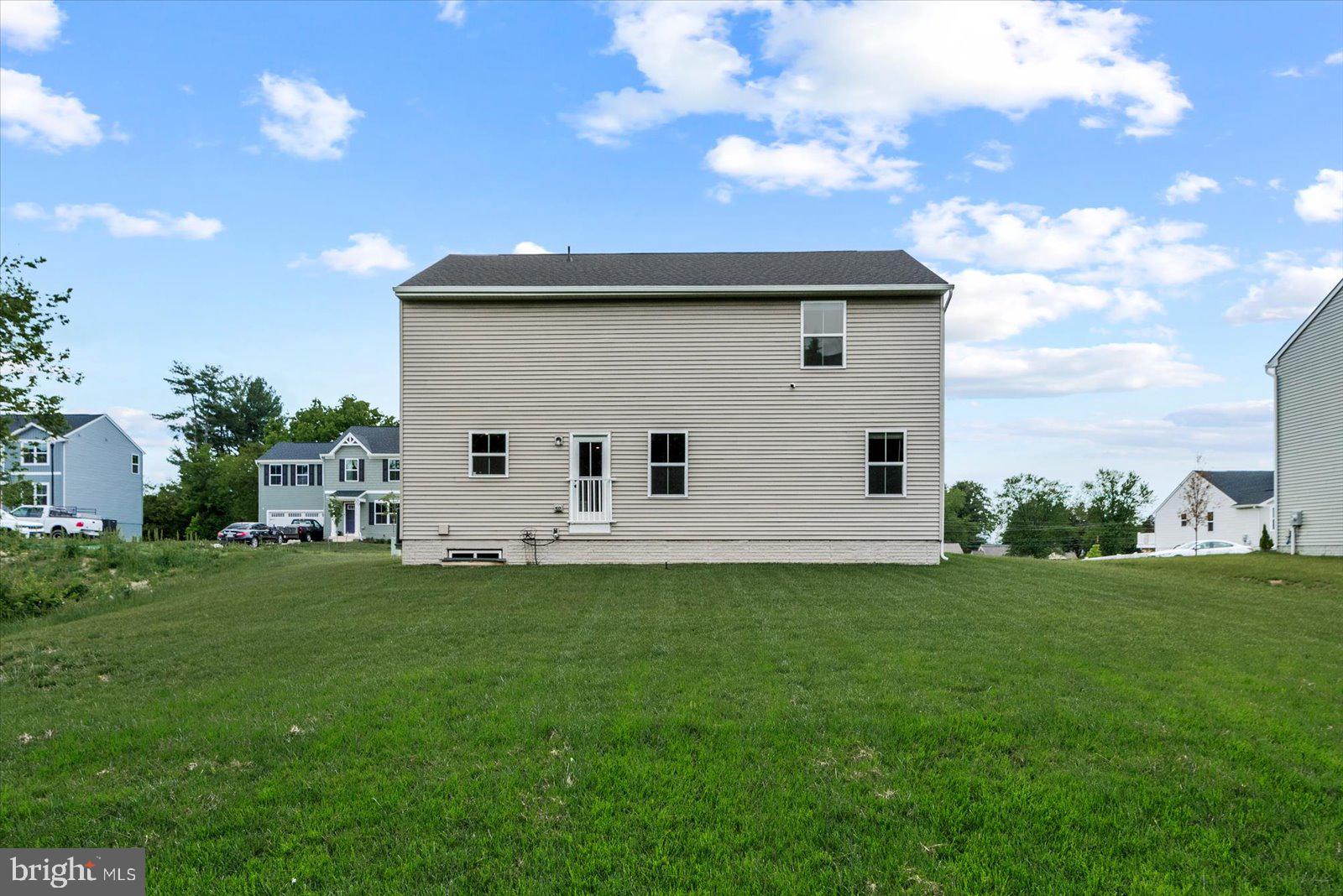 2633 High Point Drive Culpeper, VA 22701 - Photo 31 of 34 a view of a white house with a big yard