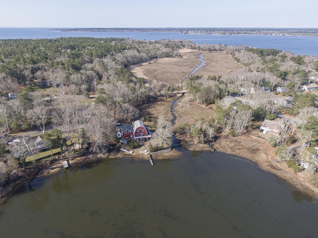 51 Edgewater Way Wareham, MA 02571 - Photo 1 of 42 an aerial view of a houses with a lake view