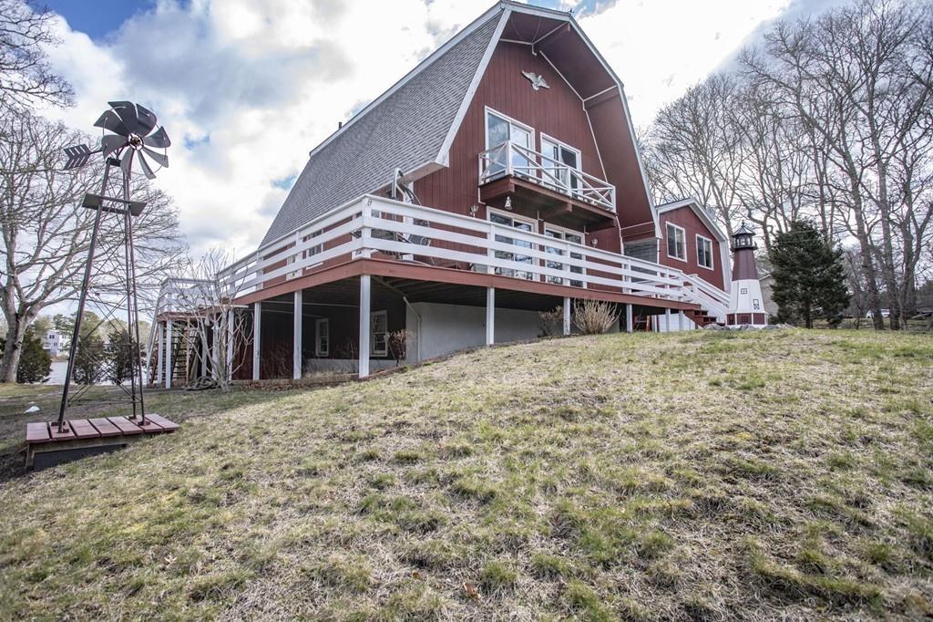 51 Edgewater Way Wareham, MA 02571 - Photo 8 of 42 a front view of a house with a yard