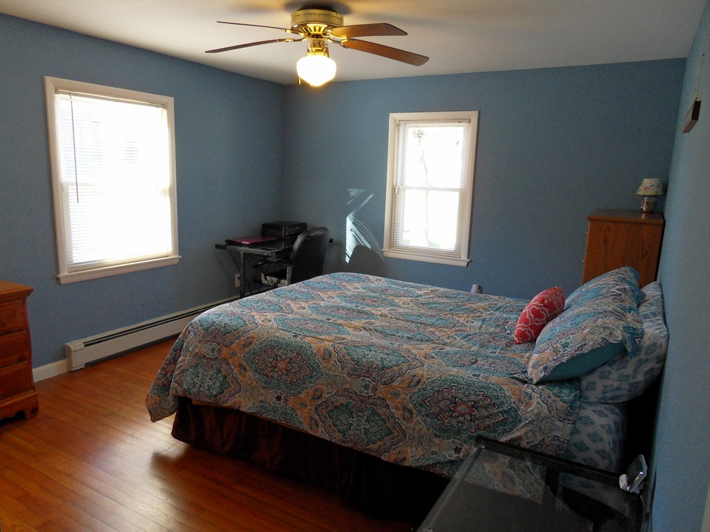 285 Thompson Road Webster, MA 01570 - Photo 11 of 20 a bedroom with a bed and window