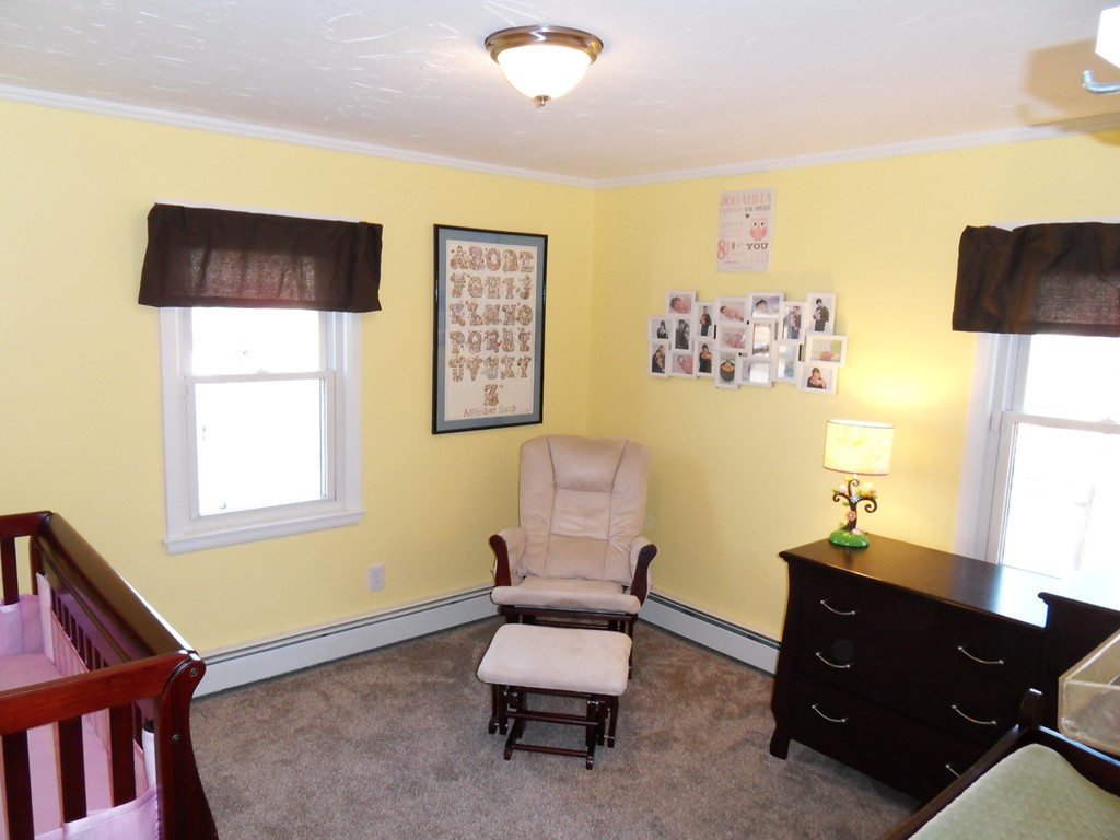 285 Thompson Road Webster, MA 01570 - Photo 15 of 20 a room with furniture and window