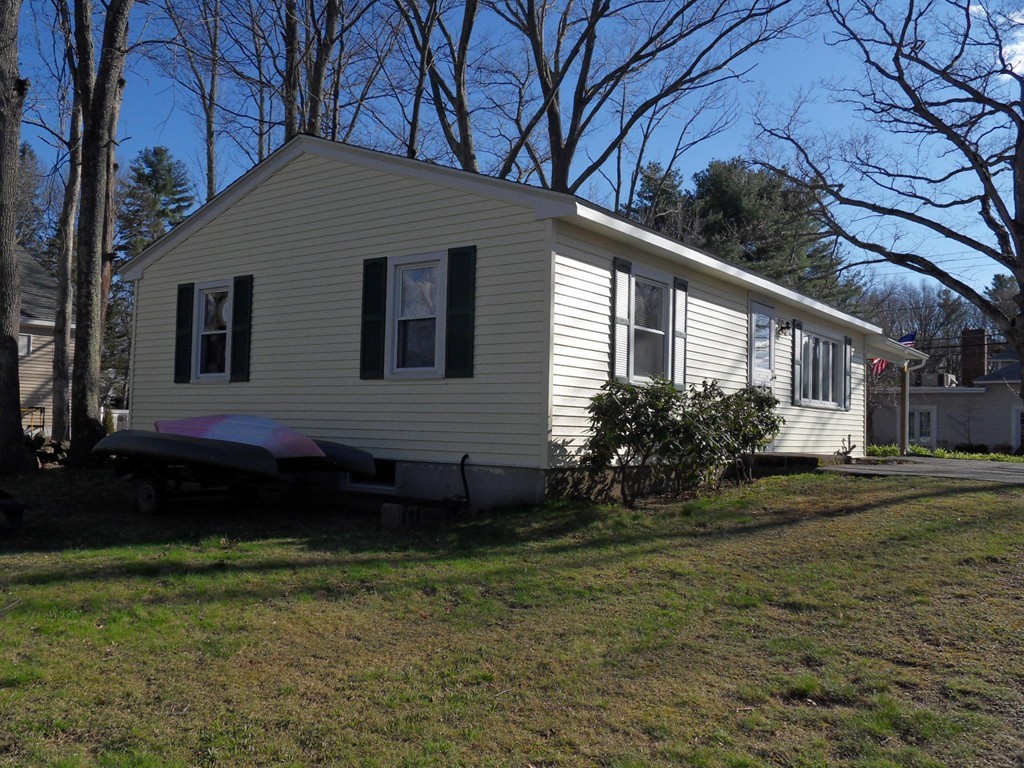 285 Thompson Road Webster, MA 01570 - Photo 17 of 20 a house view with a garden space