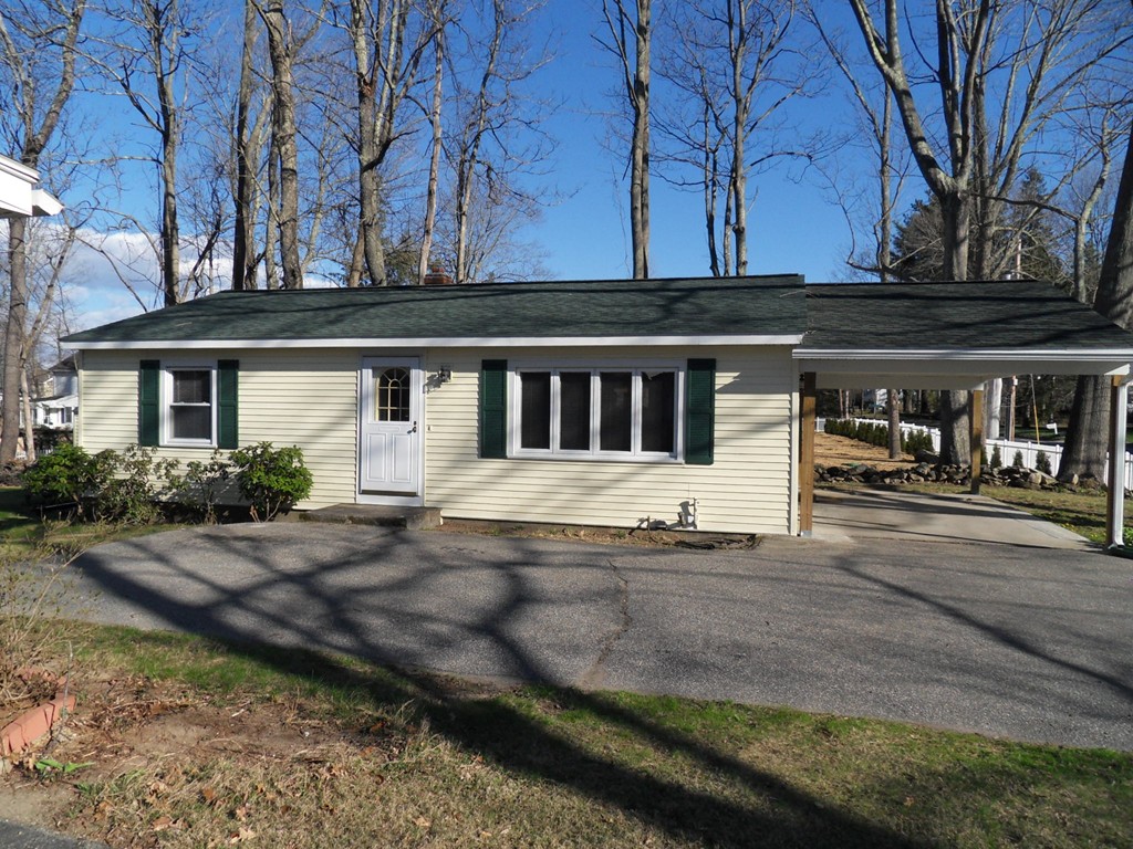 285 Thompson Road Webster, MA 01570 - Photo 2 of 20 a house view with a garden space