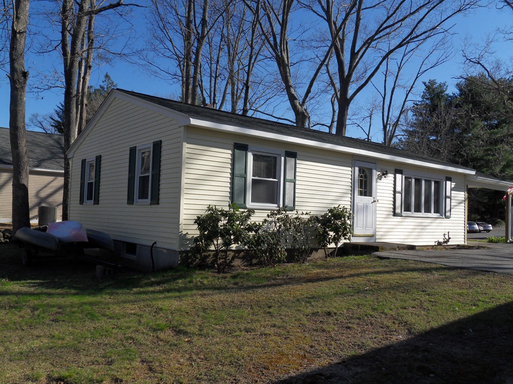 285 Thompson Road Webster, MA 01570 - Photo 3 of 20 a house view with a garden space