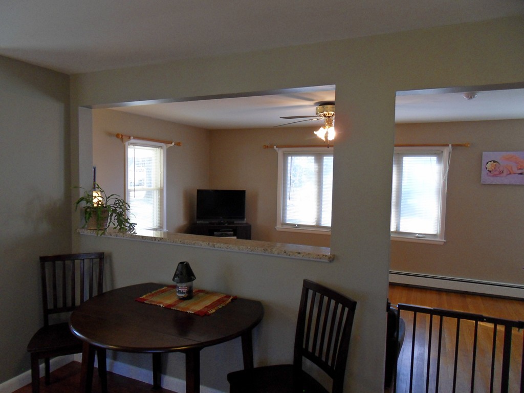 285 Thompson Road Webster, MA 01570 - Photo 6 of 20 a workspace with furniture and window