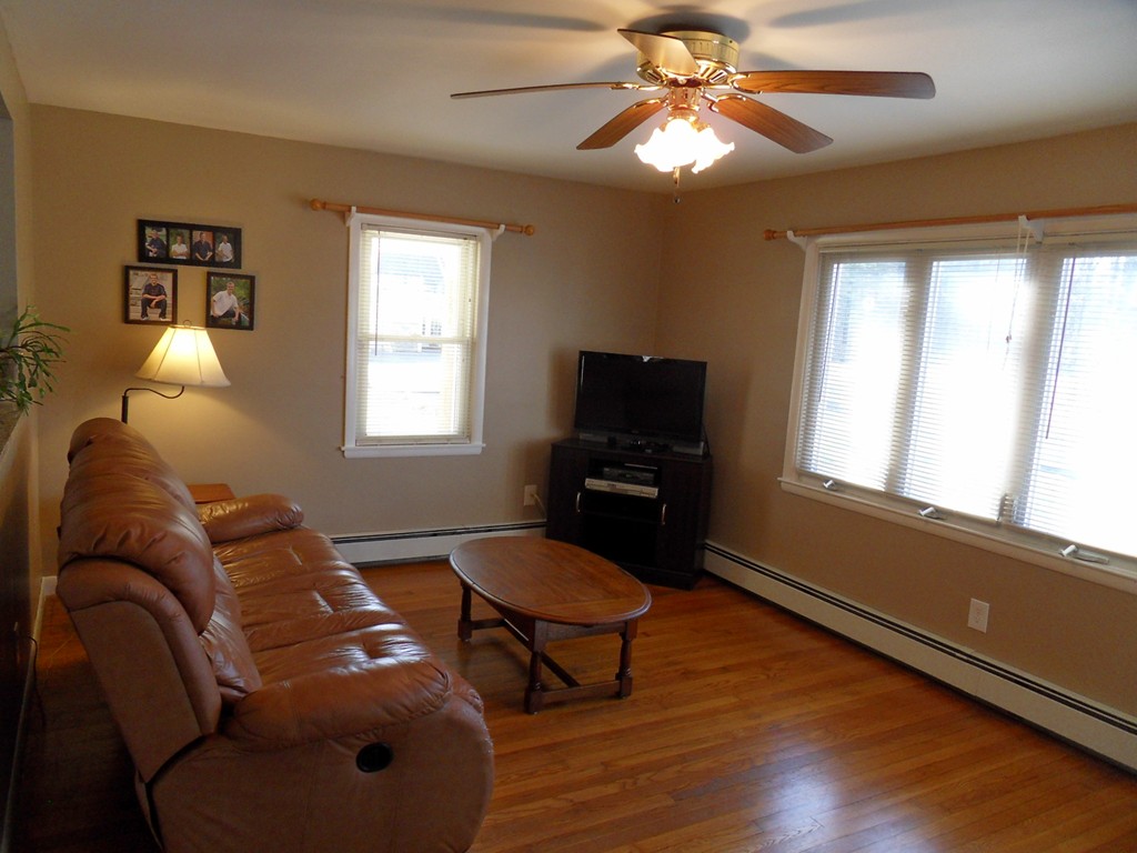 285 Thompson Road Webster, MA 01570 - Photo 7 of 20 a living room with furniture and a window