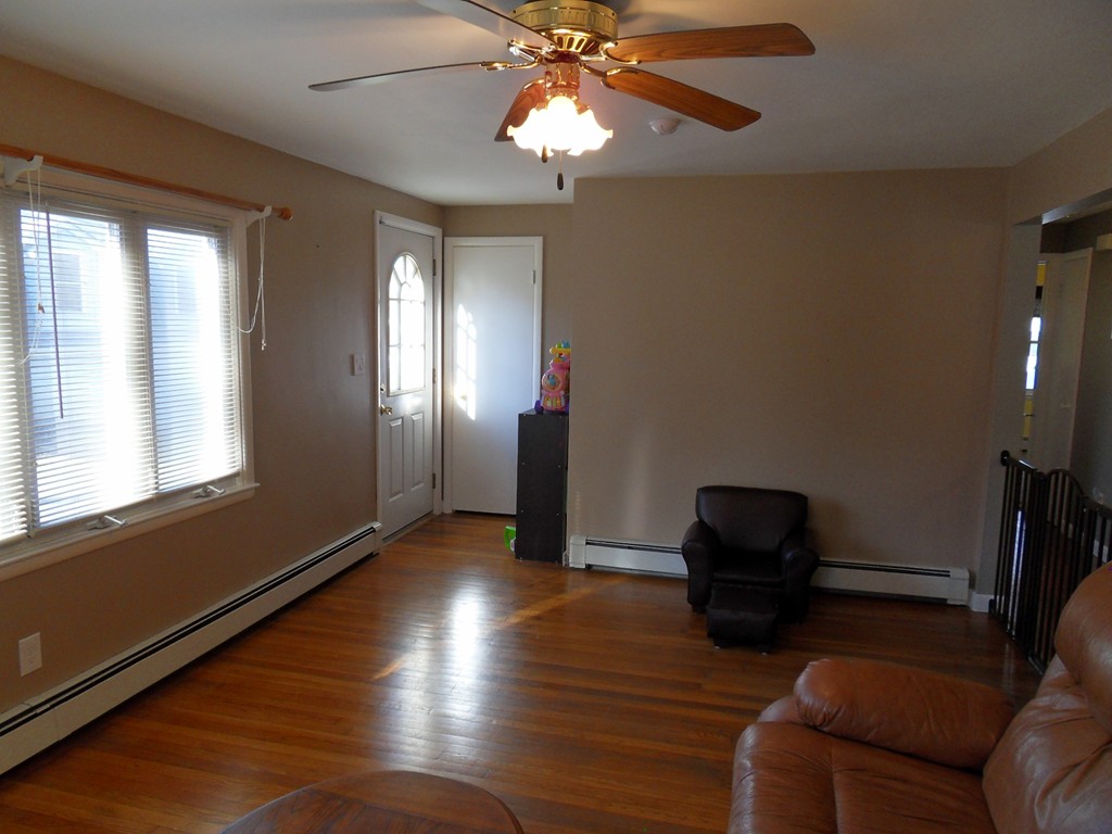 285 Thompson Road Webster, MA 01570 - Photo 9 of 20 a living room with furniture and a window