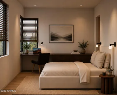 a bedroom with a bed and a potted plant