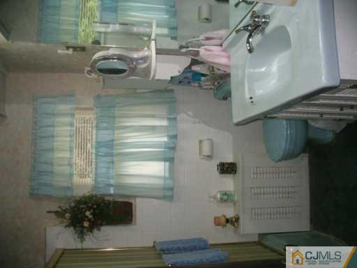 45 Greenbrook Road Middlesex, NJ 08846 - Photo 3 of 8 a bathroom with a shower