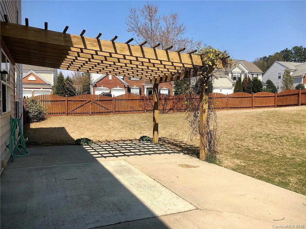 2401 Coltsgate Road Waxhaw, NC 28173 - Photo 18 of 22 a view of a balcony with an ocean view