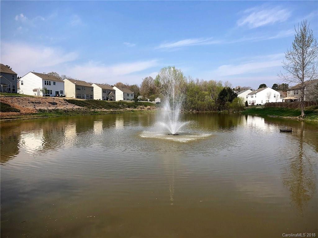 2401 Coltsgate Road Waxhaw, NC 28173 - Photo 22 of 22 a view of a lake with houses