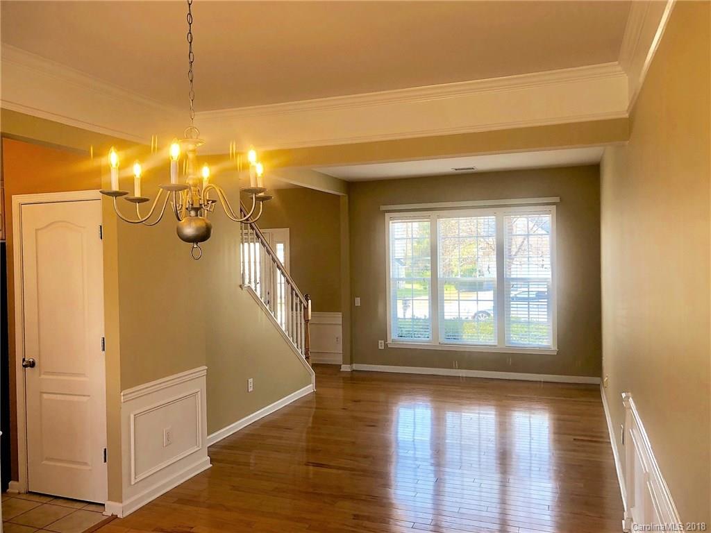 2401 Coltsgate Road Waxhaw, NC 28173 - Photo 5 of 22 a view of livingroom with hardwood floor and window