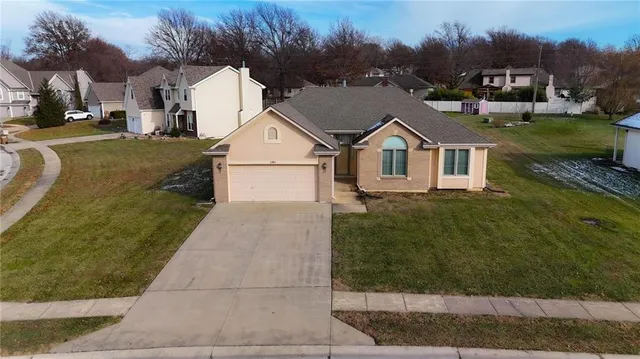 $350,000 | 105 North Lakeshore Drive, Raymore, MO 64083