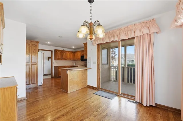 $350,000 | 105 North Lakeshore Drive, Raymore, MO 64083