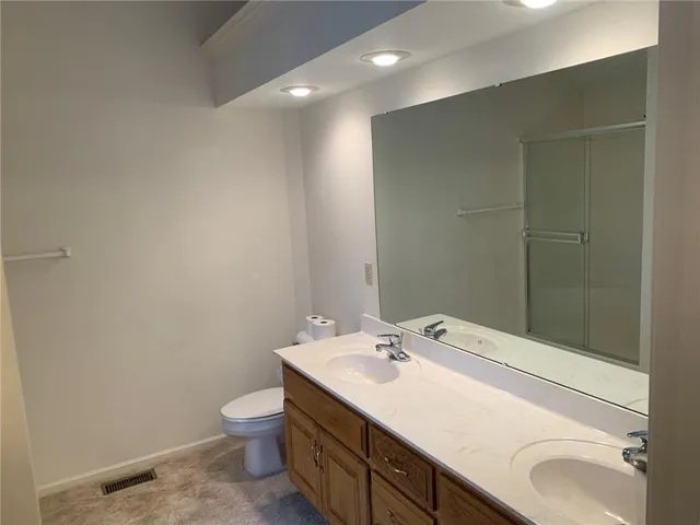 $350,000 | 105 North Lakeshore Drive, Raymore, MO 64083