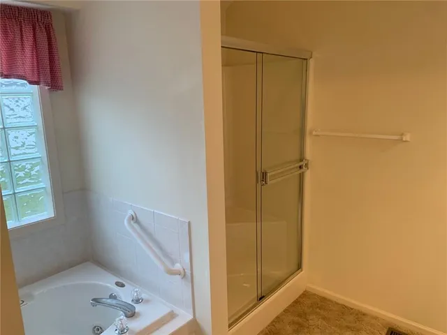 $350,000 | 105 North Lakeshore Drive, Raymore, MO 64083