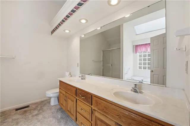 $350,000 | 105 North Lakeshore Drive, Raymore, MO 64083