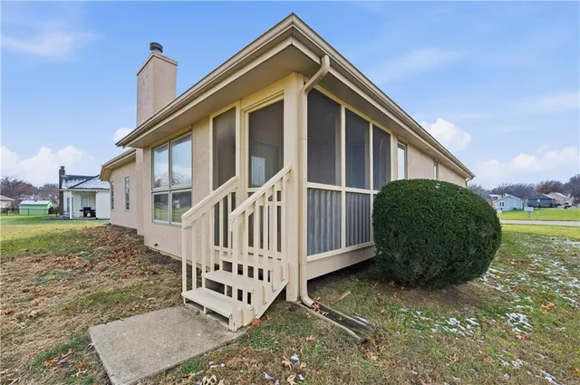 $350,000 | 105 North Lakeshore Drive, Raymore, MO 64083