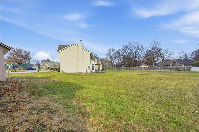 $350,000 | 105 North Lakeshore Drive, Raymore, MO 64083