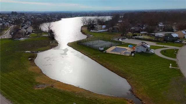 $350,000 | 105 North Lakeshore Drive, Raymore, MO 64083